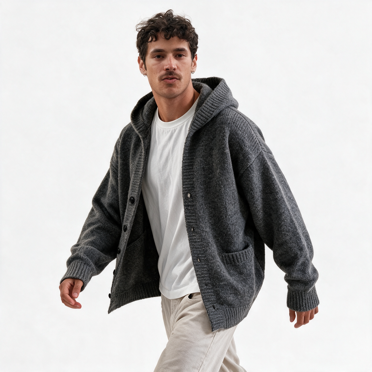 Vintage Hooded Cardigan in Dark Gray — AI-generated image of an adult male model wearing the hooded knit cardigan (walking)