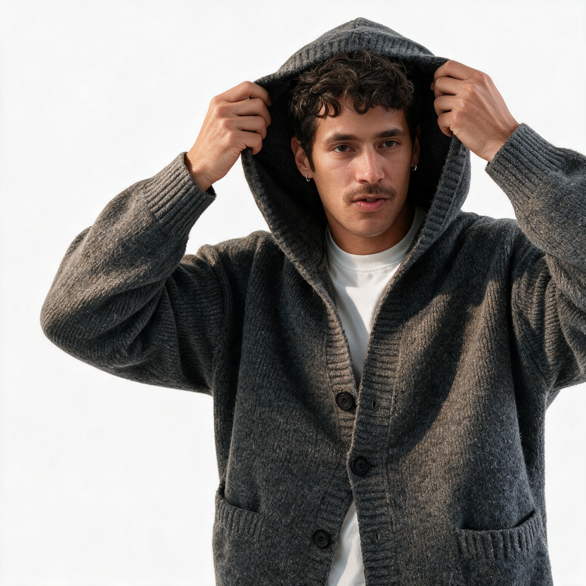 Vintage Hooded Cardigan in Dark Gray — AI-generated image of an adult male model wearing the hooded knit cardigan (pulling the hood up)